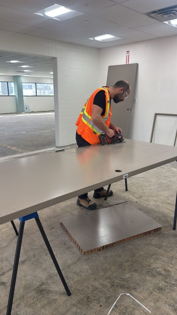 a man working on door installation