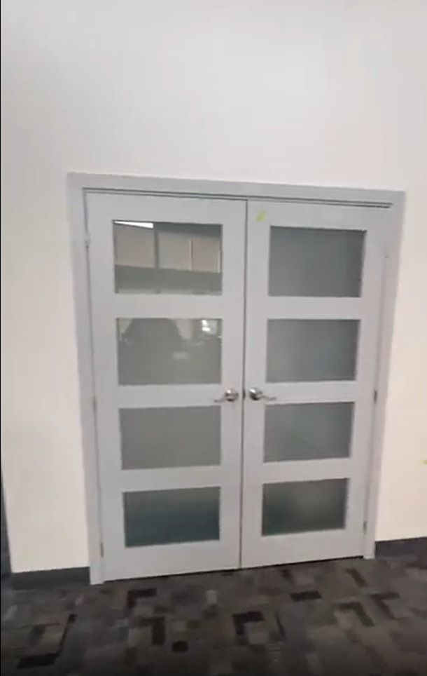 Metal door installation for office in Barrie